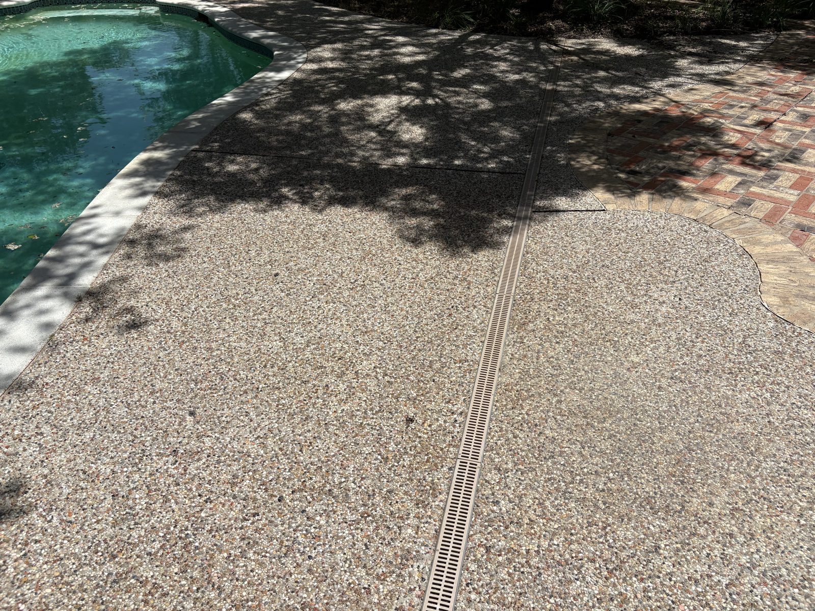 Pool deck after pressure washing, Stephenville TX